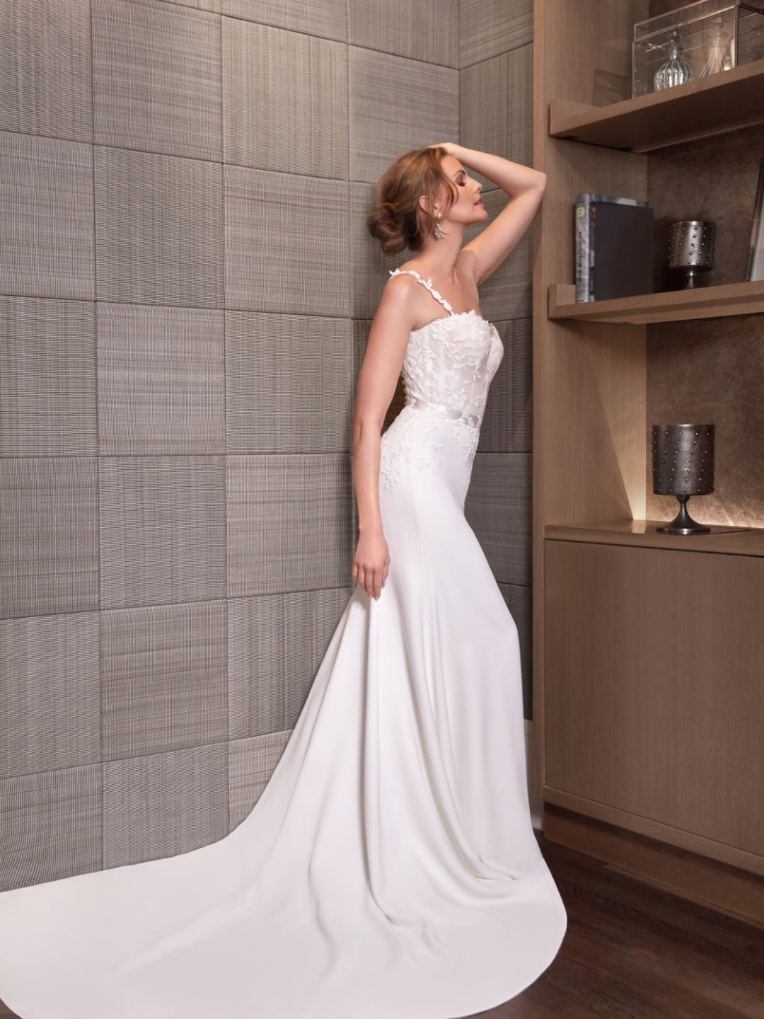 Seductive and sensuous, the Caroline Castigliano Sonata wedding dress features a structured bustier bodice and a figure-skimming Italian crepe fit-and-flare skirt. Find your perfect wedding dress at Your Dream Bridal near Boston.
